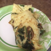 Quail egg omelet with spinach and mushrooms